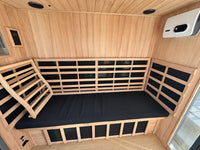 Black sauna bench cushion with a wooden backrest