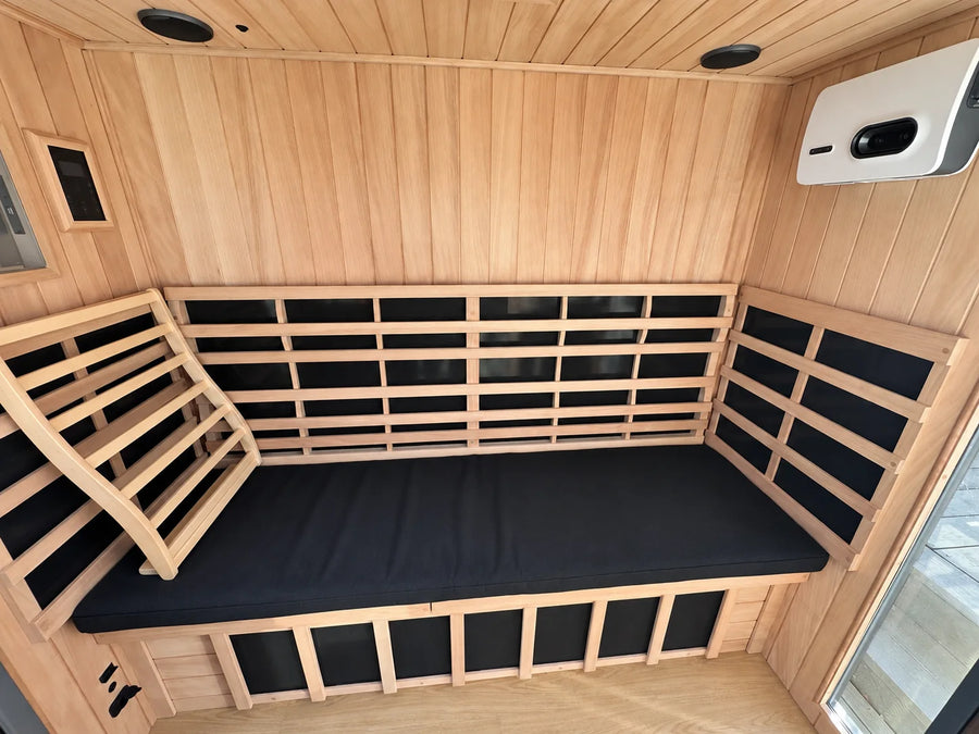 Black sauna bench cushion with a wooden backrest
